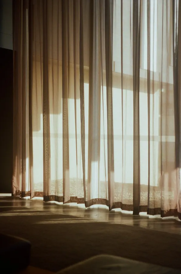 Light sheer curtains in a warm room
