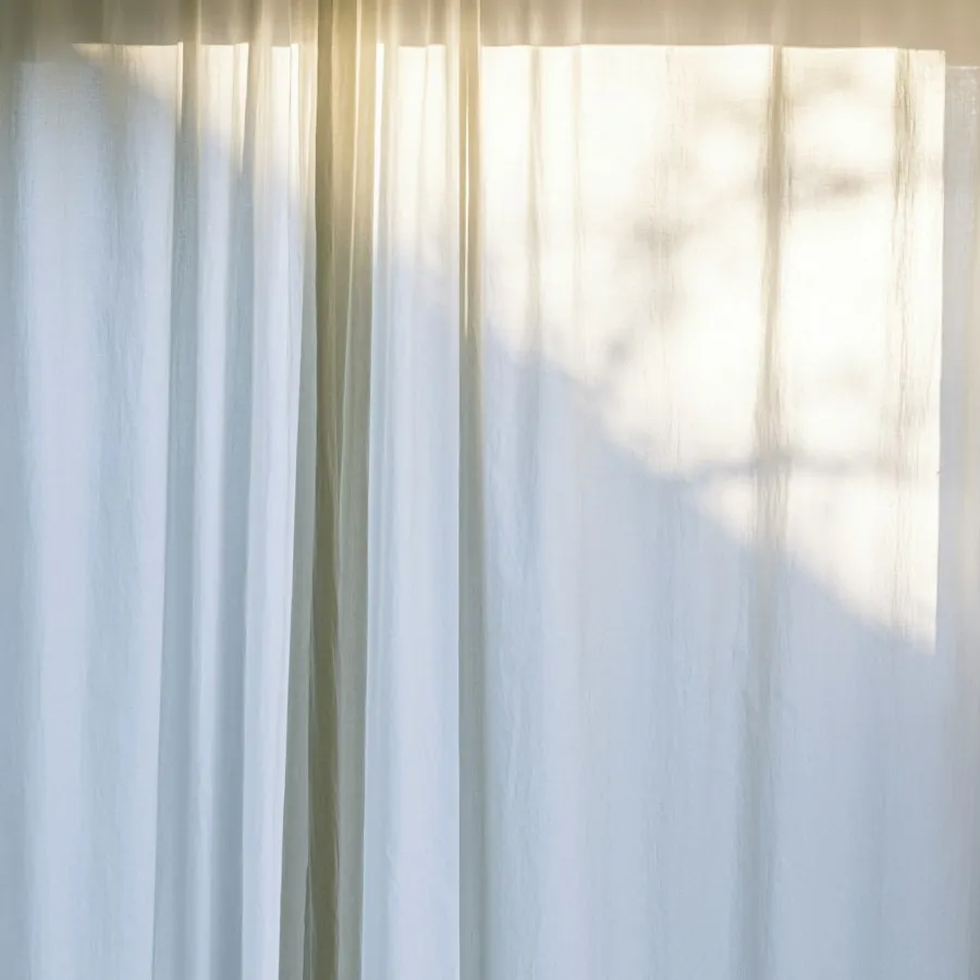 White linen curtain in soft daylight