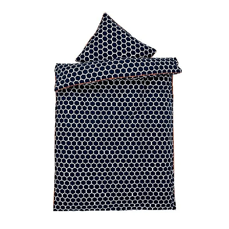Navy duvet cover set with a white honeycomb print