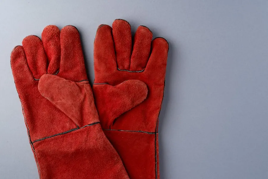 Pair of red leather safety gloves