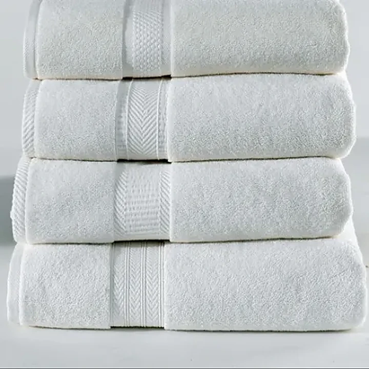 Stack of white cotton hotel towels